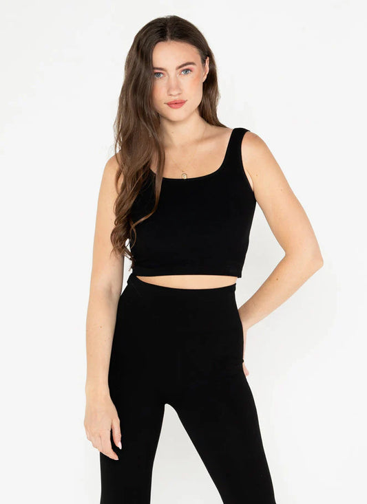 Woman wearing Câ€™est Moi bamboo ribbed square neck tank top in black